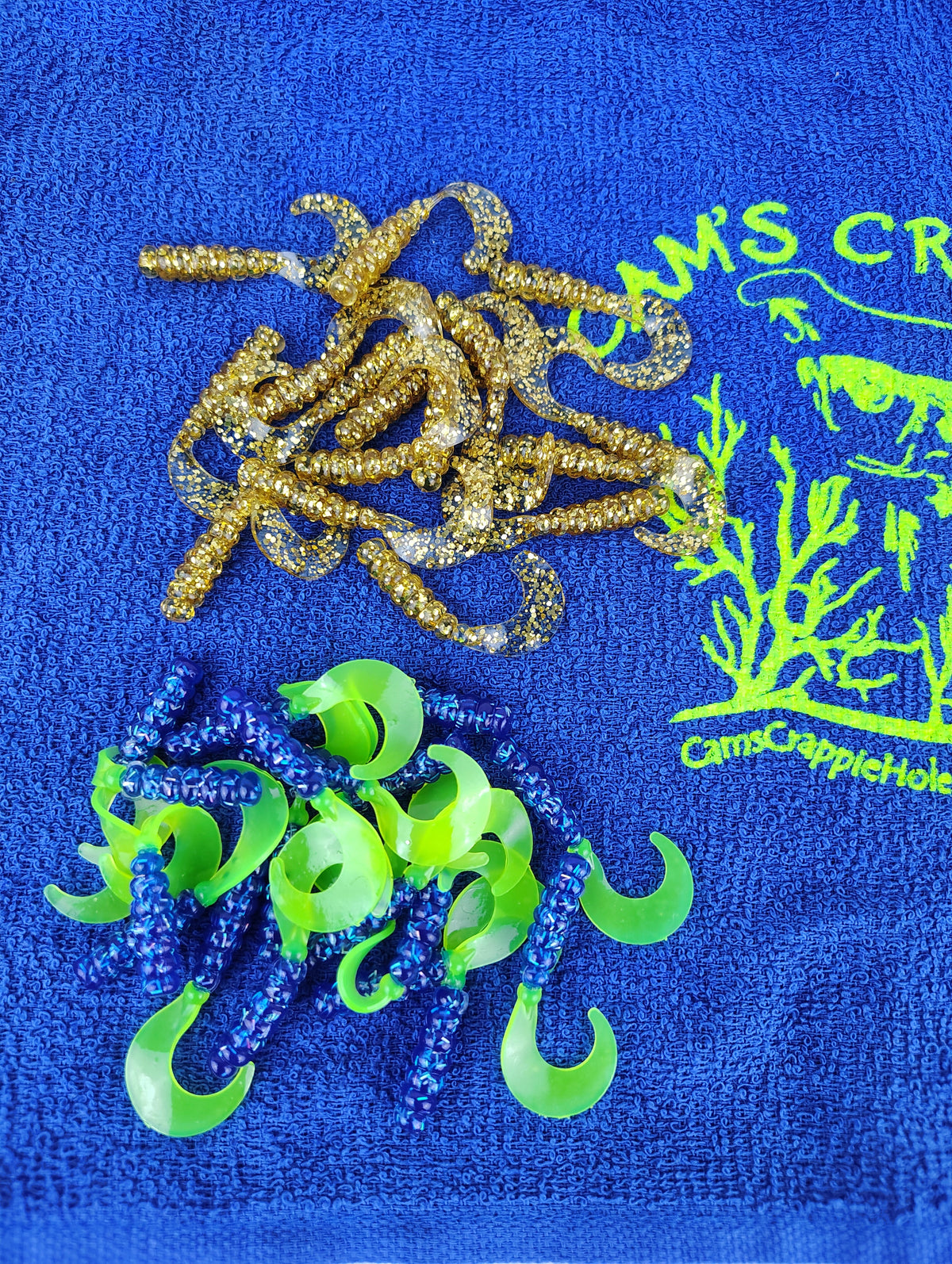 Cam's 2"(HOLOGRAM FLAKE) MR OCTOBER GOLD/FIREBALL BLUE 100pc (SPLIT SET) Curly Tail Crappie Soft Jigs [A Cam's Exclusive