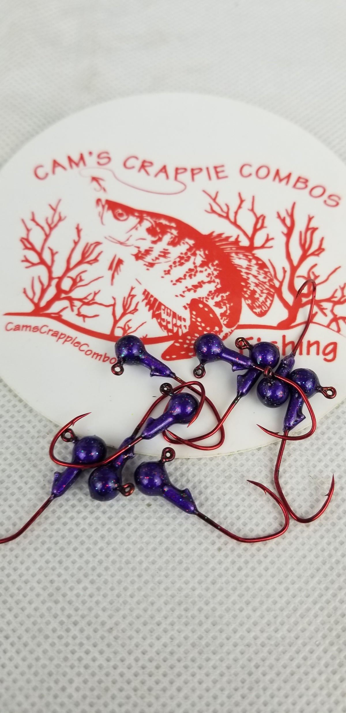 40 pk. 1/32 oz. Cam's "PURPLE PASSION" Painted jigs with Collar and #2 Red Chrome "NASTY BEND HOOK"