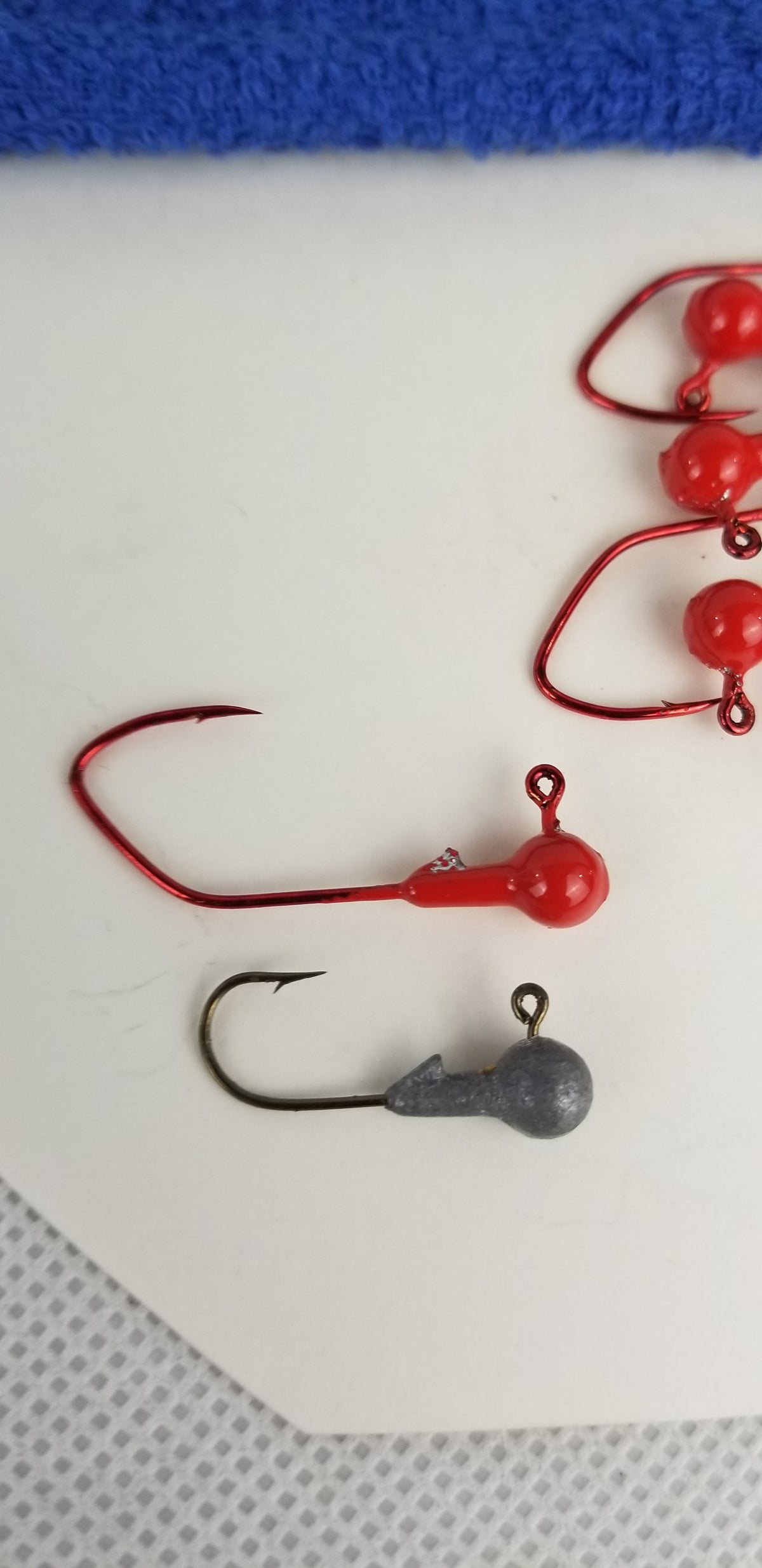 25ct.- 1/8oz. Unpainted Cam's DIESEL BUILT Candy Redd Head w/ 1/0 Deadly Blood Red Hooks (Chemically Sharpened)