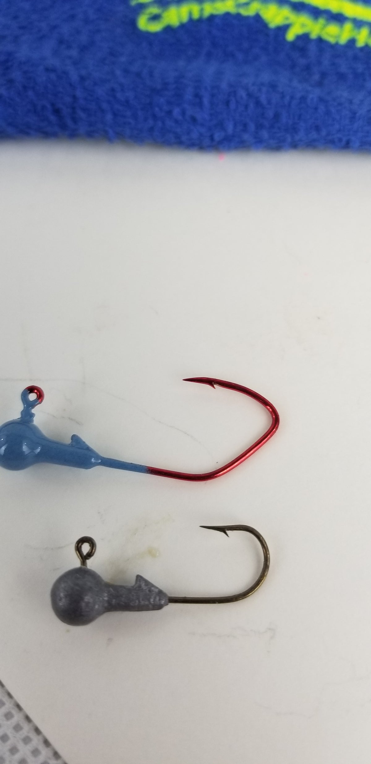 25ct.- 1/8oz. Painted Cam's DIESEL BUILT Sky Blue Head w/ 1/0 Deadly Blood Redd Hooks (Chemically Sharpened)